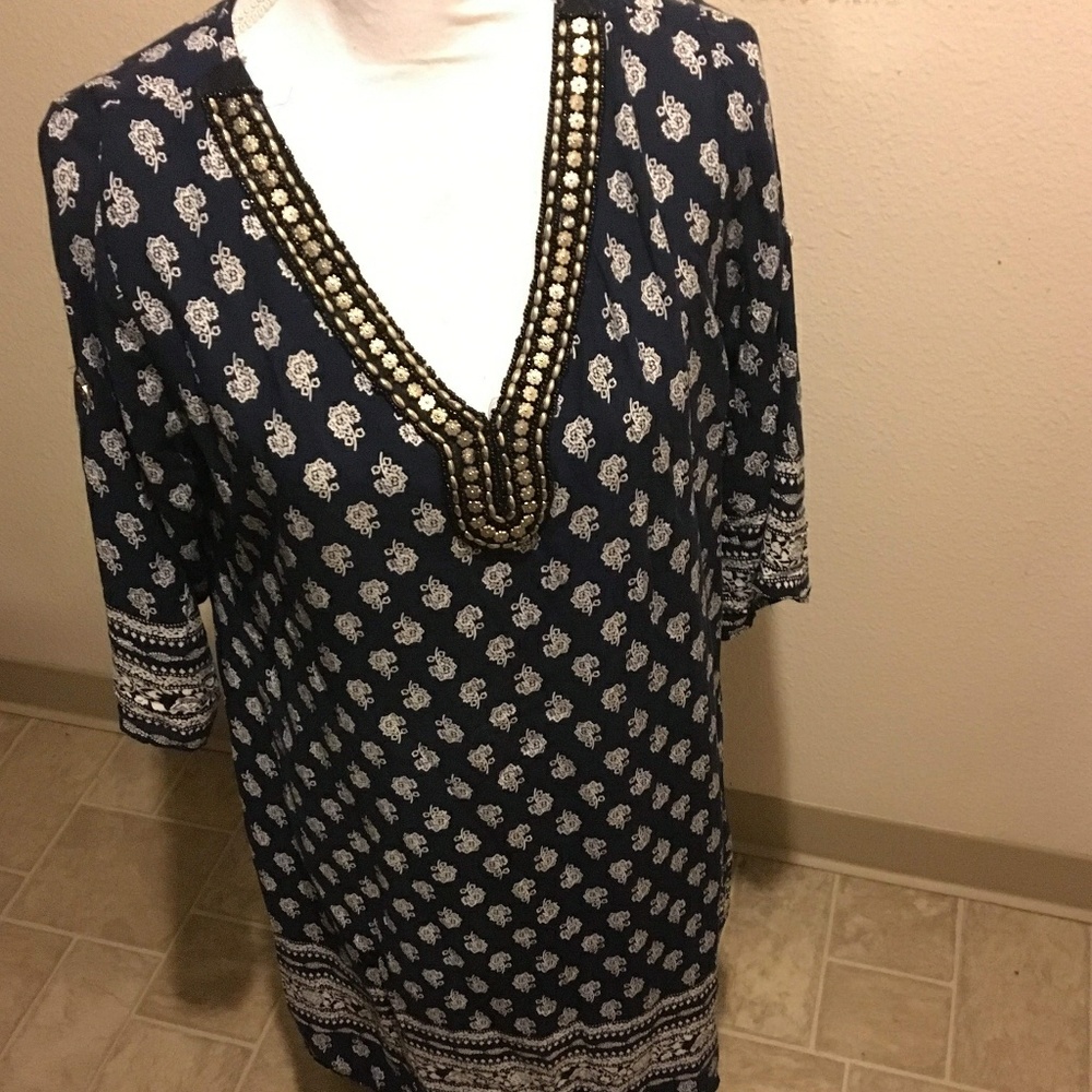 Dress size medium color darkish blue with grayish